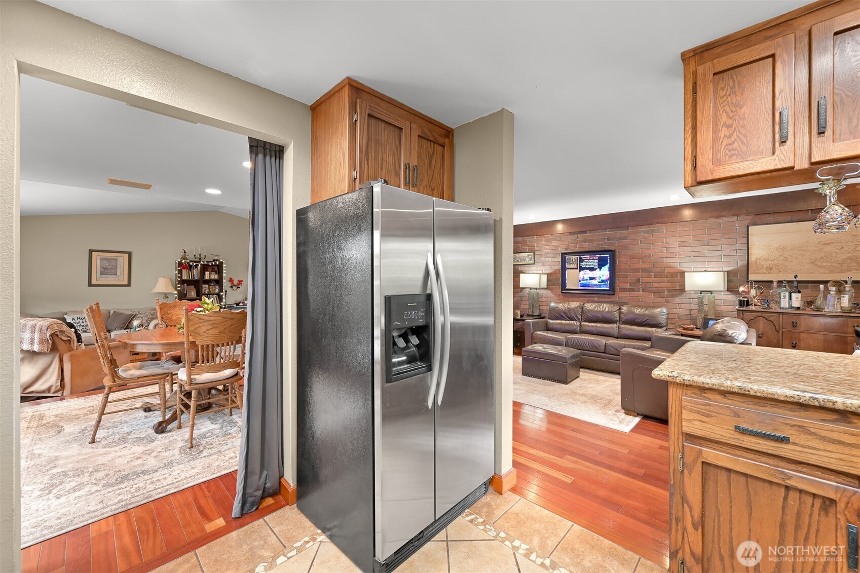 214 Bayside Place Bellingham, WA 98225 - Photo 21 of 40 a kitchen with stainless steel appliances granite countertop a refrigerator and a stove
