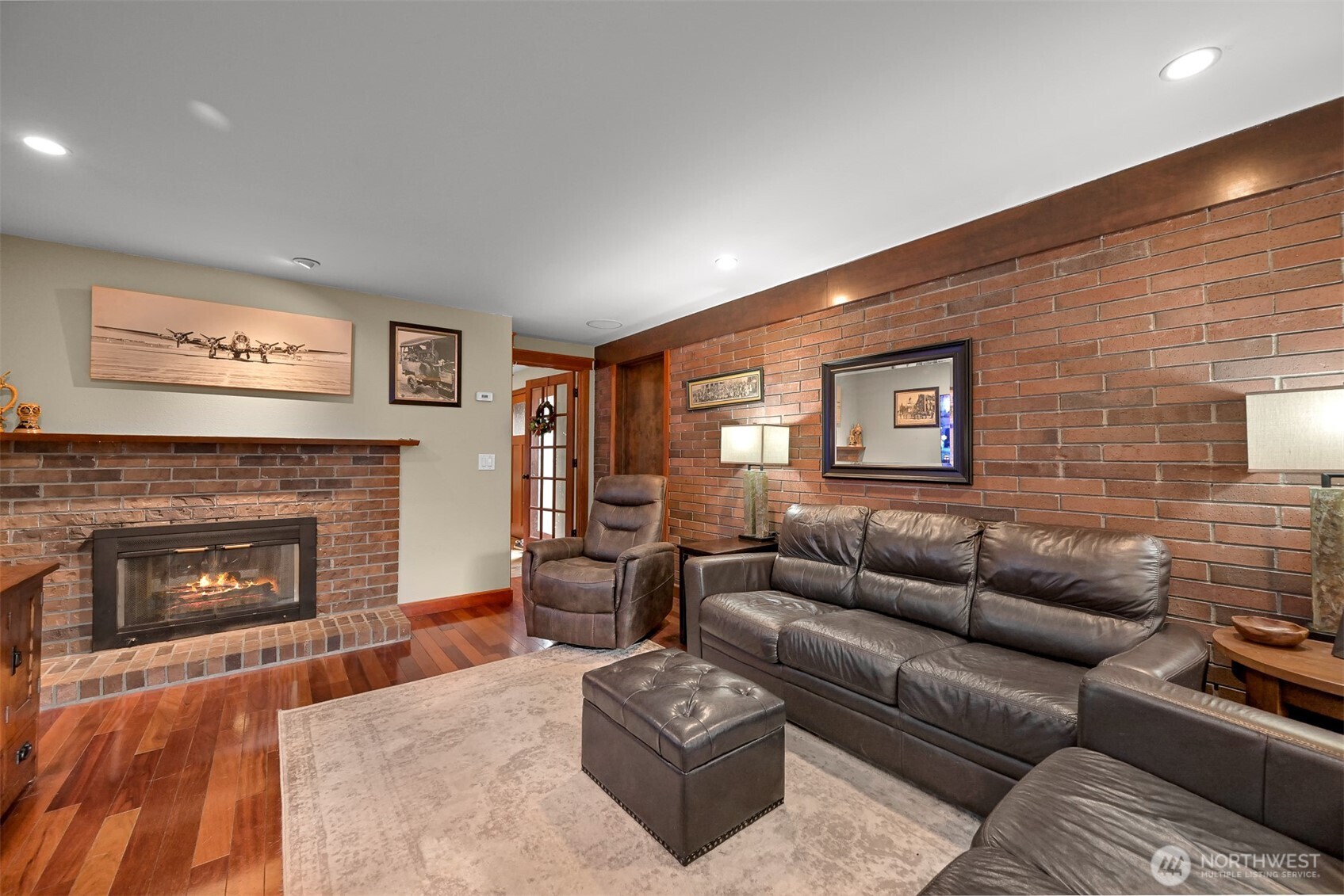 214 Bayside Place Bellingham, WA 98225 - Photo 23 of 40 a living room with furniture and a fireplace