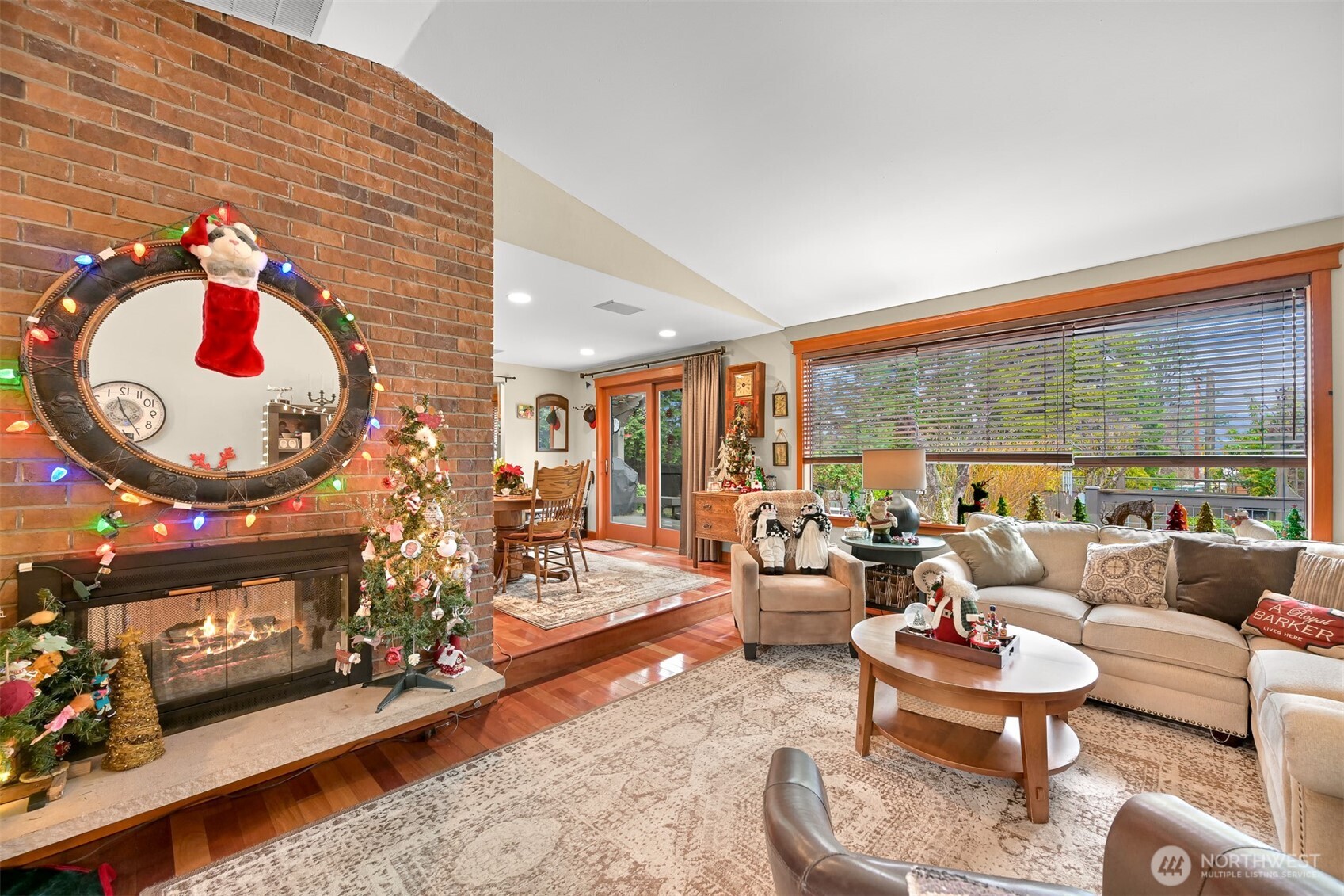 214 Bayside Place Bellingham, WA 98225 - Photo 5 of 40 a living room with fireplace furniture and a large window