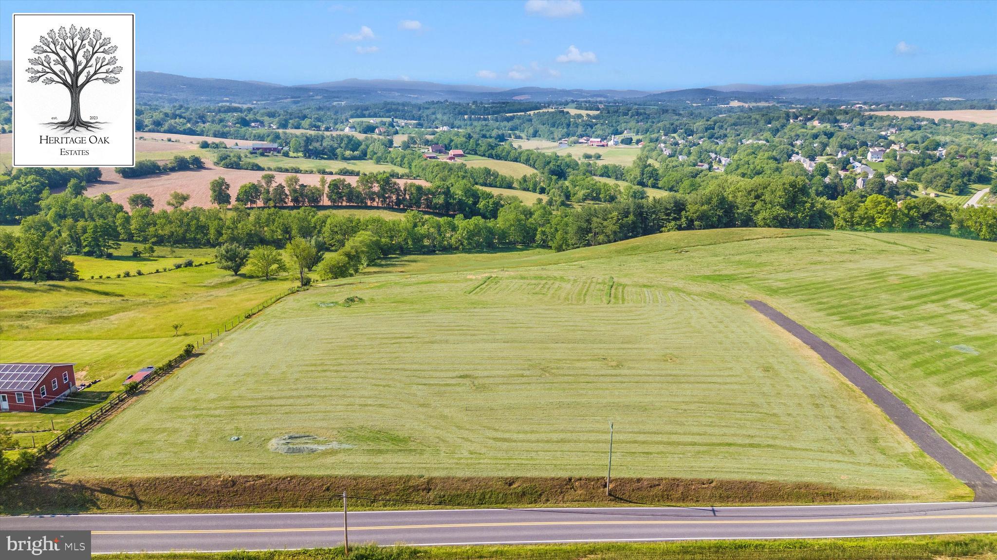 7452 Heritage Oak Terrace Middletown, MD 21769 - Photo 7 of 11 a view of an outdoor space and lakeside