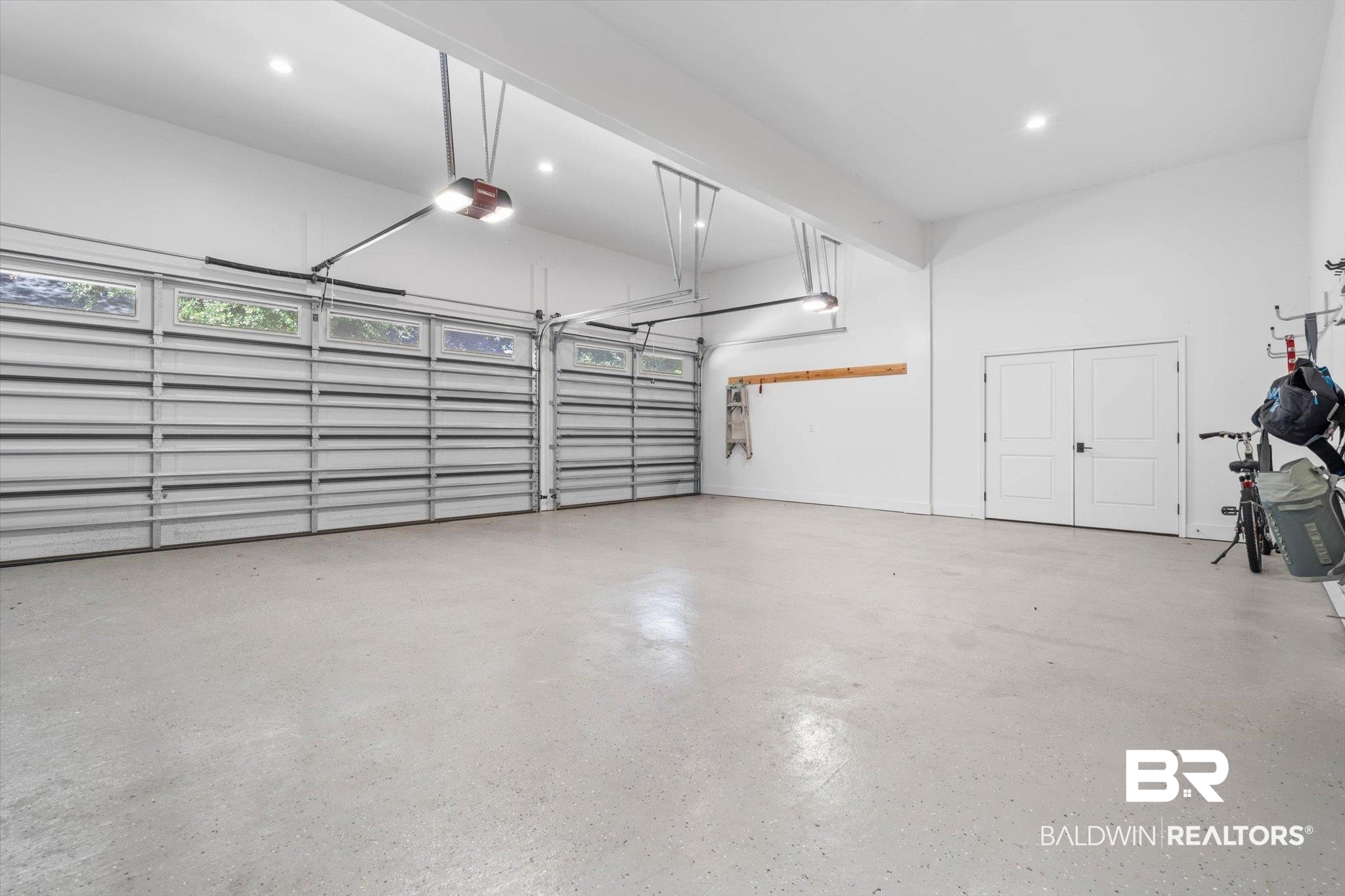 4602 Kingswood Drive Mobile, AL 36608 - Photo 38 of 45 Garage featuring a garage door opener and recessed lighting