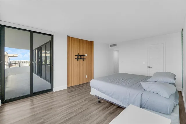 a bathroom with a sink a mirror and a toilet