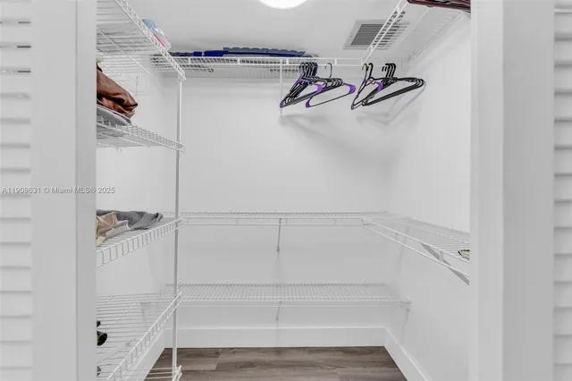 a view of a living room with a large window