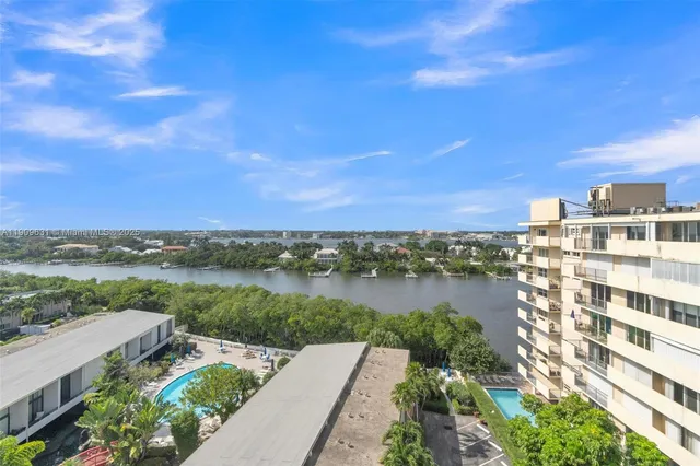 a view of kitchen with stainless steel appliances cabinets and a counter top space