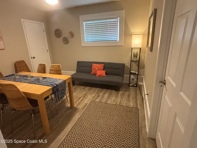 a bedroom with a bed and a table