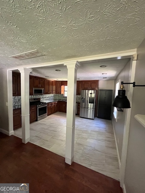 1221 Martin Nash Road Southwest Lilburn, GA 30047 - Photo 13 of 31 a view of a hallway with wooden floor
