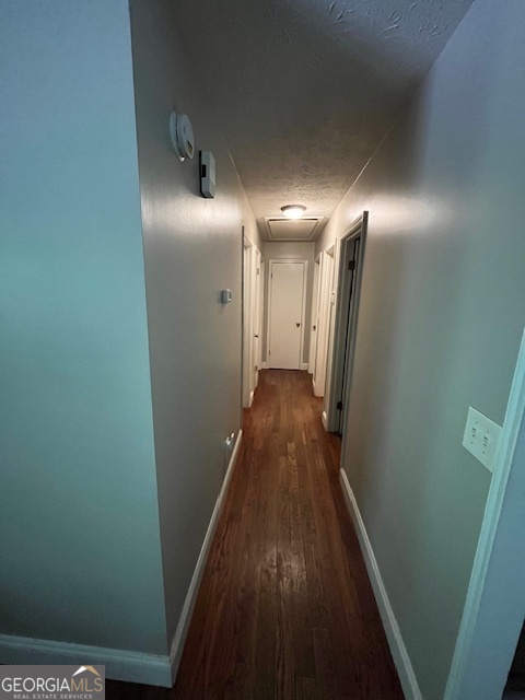 1221 Martin Nash Road Southwest Lilburn, GA 30047 - Photo 16 of 31 a view of a hallway with wooden floor