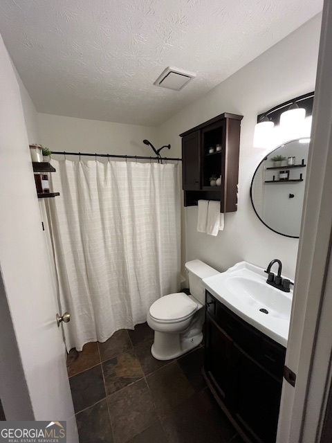 1221 Martin Nash Road Southwest Lilburn, GA 30047 - Photo 18 of 31 a bathroom with a sink toilet and shower