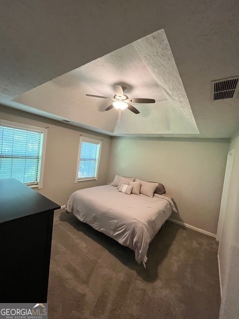 1221 Martin Nash Road Southwest Lilburn, GA 30047 - Photo 24 of 31 a bedroom with a bed and a window