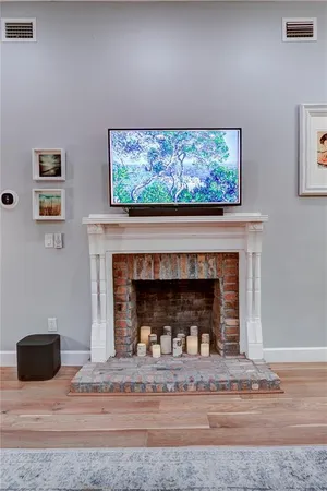 a living room with a fireplace