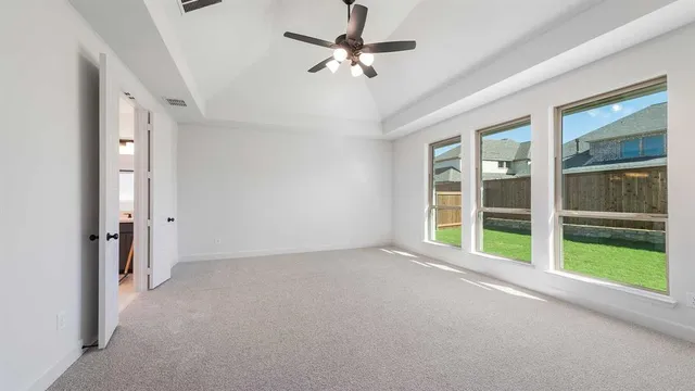 a large spacious bathroom with a double vanity sink a mirror and a bathtub