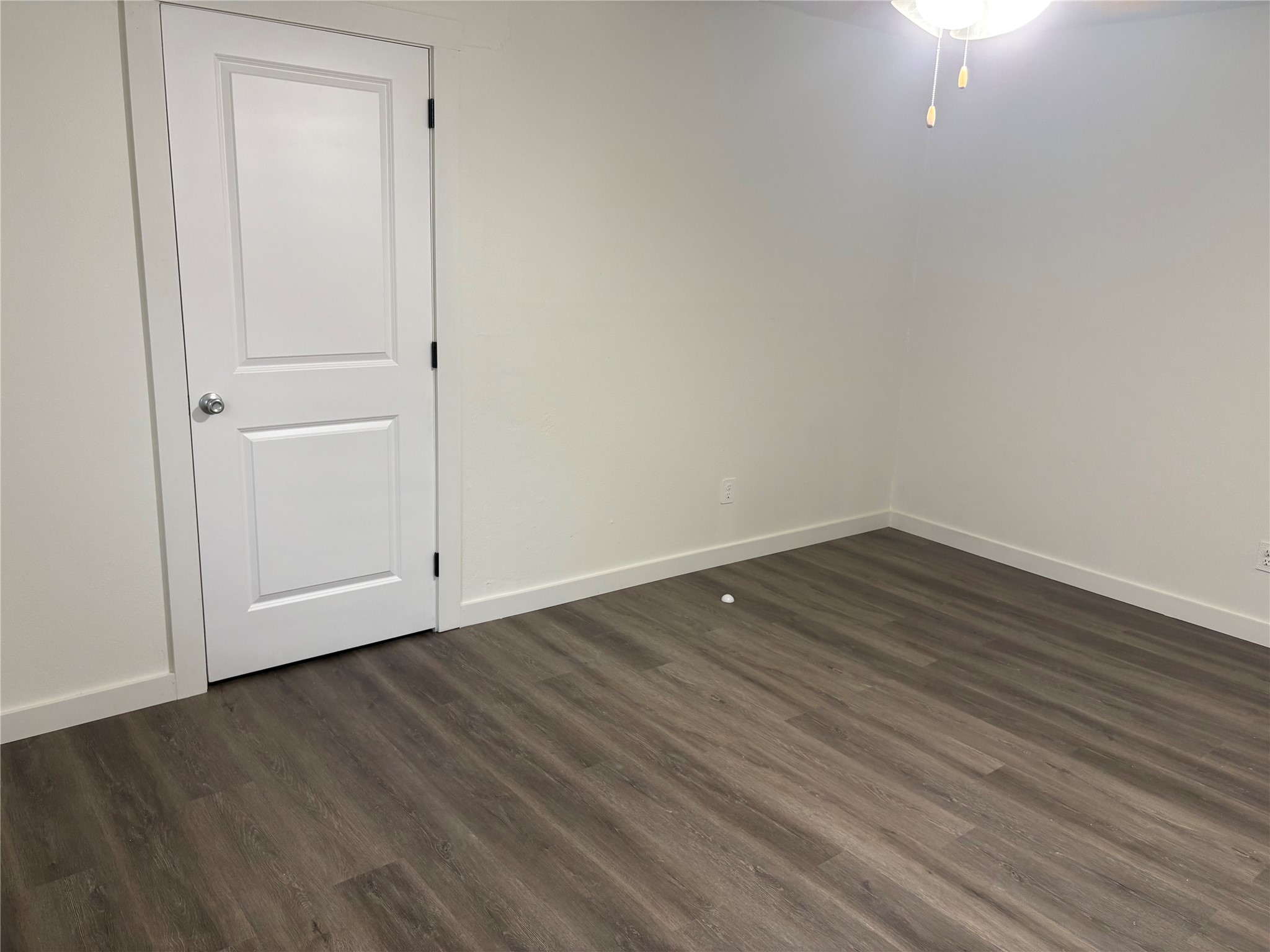 11913 Rennalee Loop Austin, TX 78753 - Photo 23 of 40 A quiet space awaits with durable flooring and a ceiling-mounted light fixture.