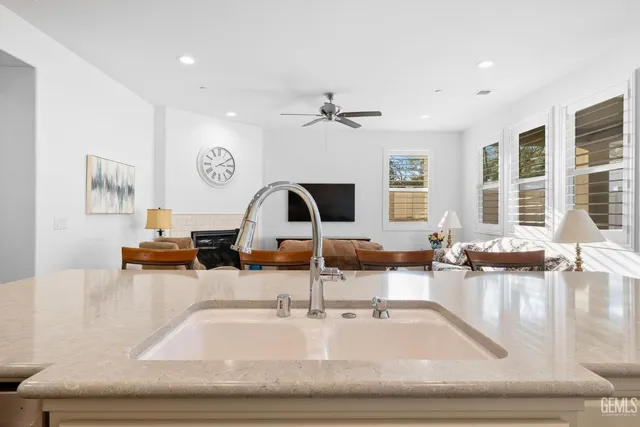 a bathroom with a shower and a sink
