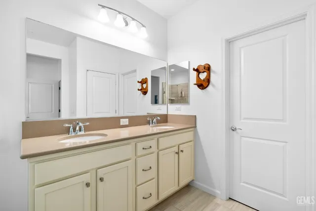 a front view of a house with garden and porch