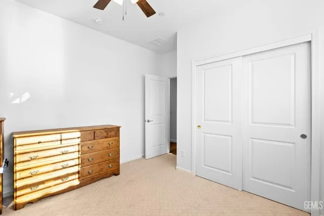 an aerial view of a residential houses with outdoor space