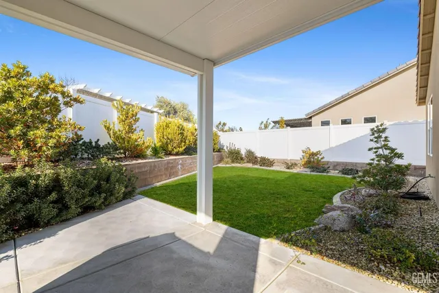 a view of a golf course with a lake