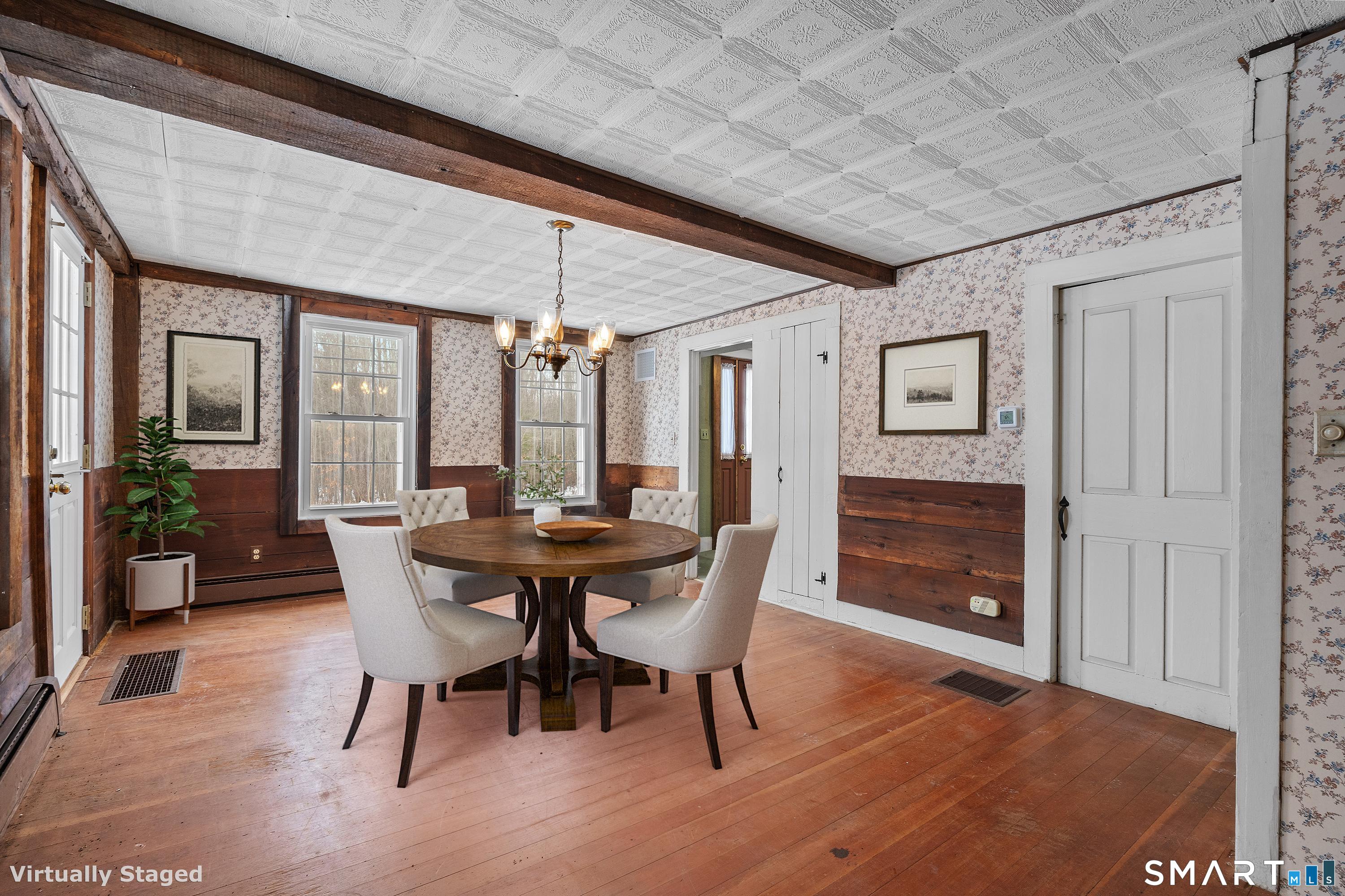 392 Boston Neck Road Suffield, CT 06078 - Photo 16 of 35 a dining room with furniture and window