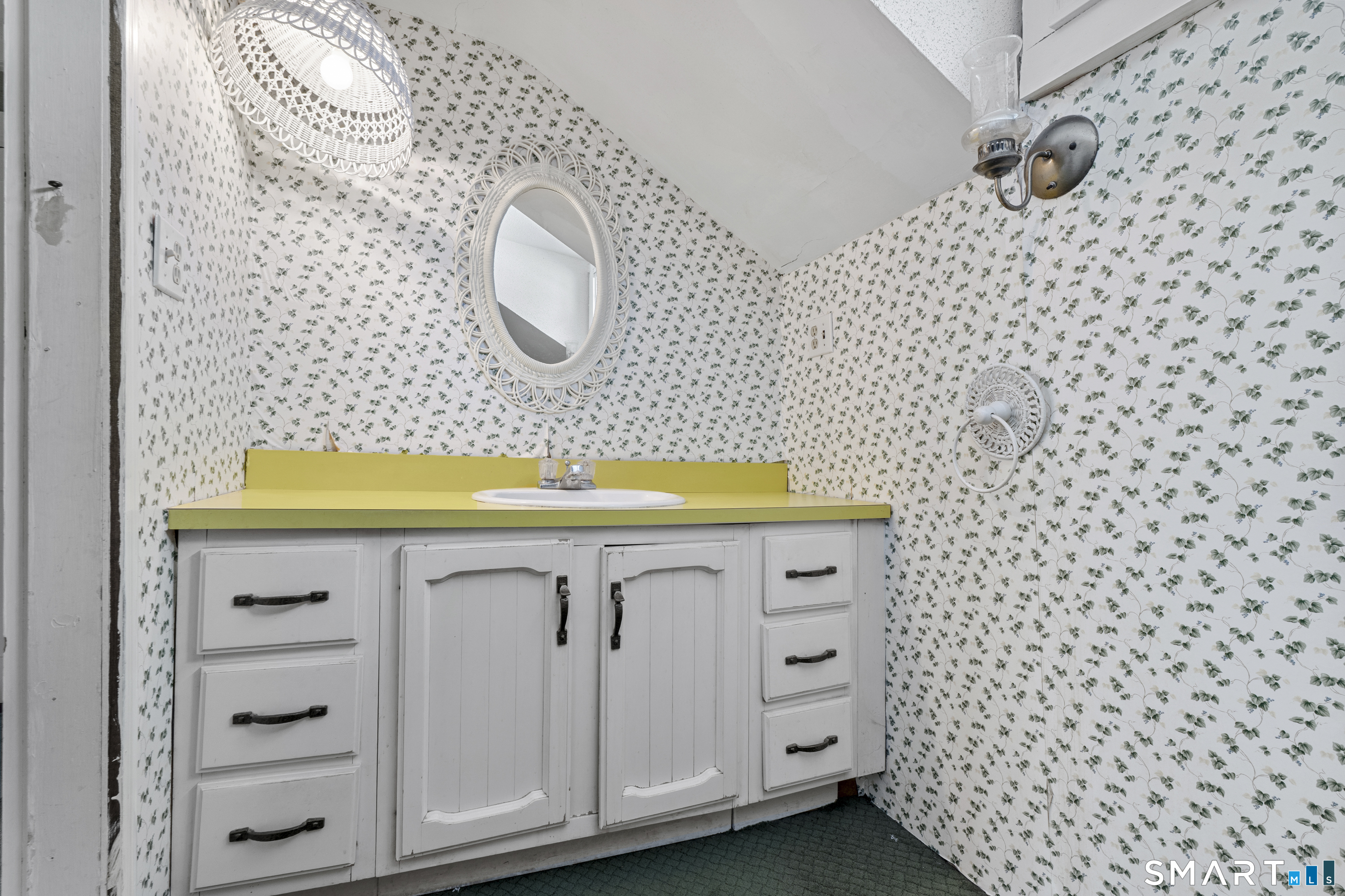 392 Boston Neck Road Suffield, CT 06078 - Photo 31 of 35 a bathroom with a sink and a mirror