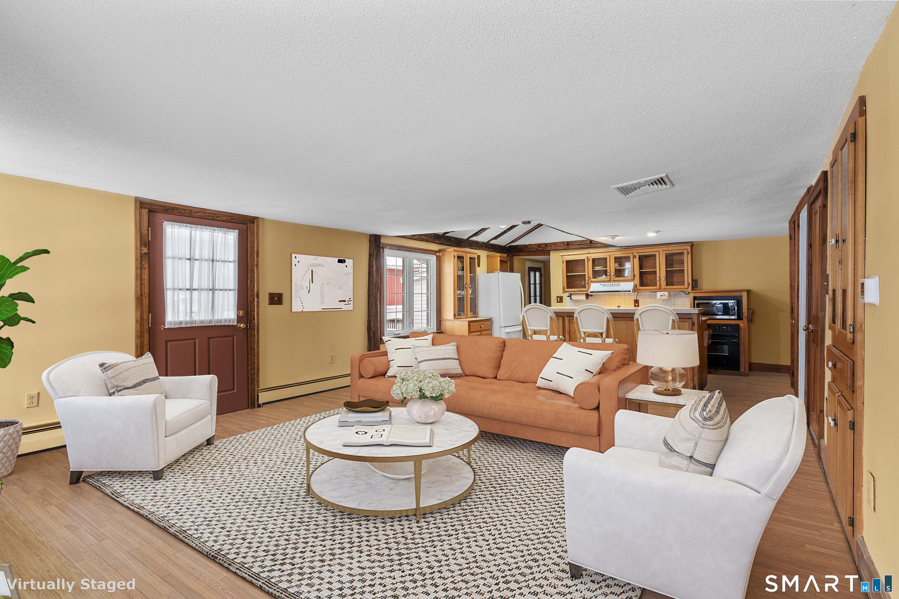 392 Boston Neck Road Suffield, CT 06078 - Photo 6 of 35 a living room with furniture and a large window