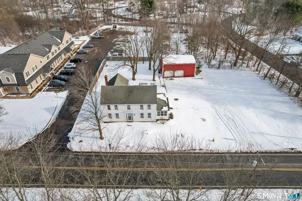 a kitchen with a stove and a refrigerator