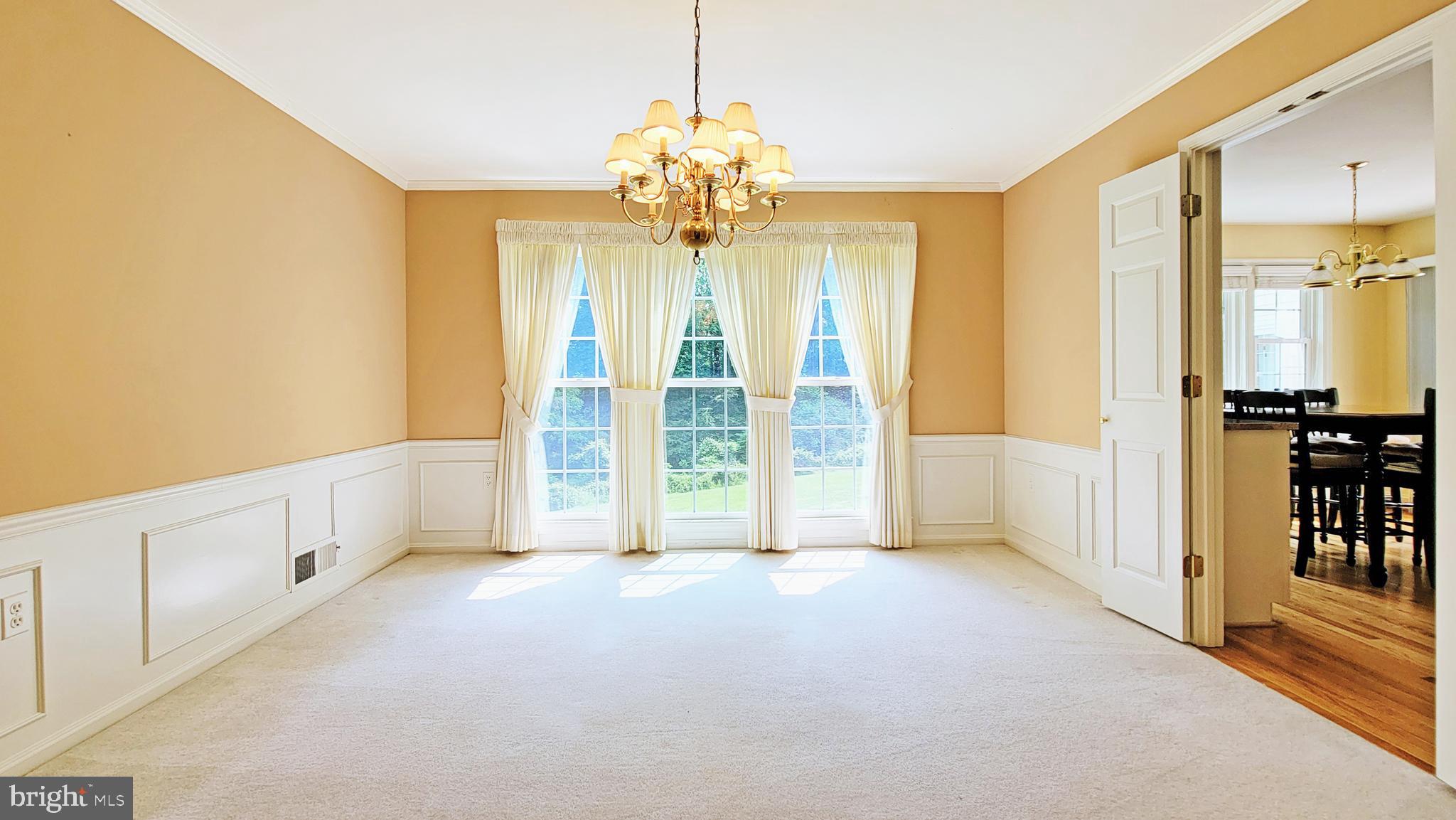 8219 Riding Ridge Place McLean, VA 22102 - Photo 21 of 79 SPACIOUS DINING ROOM OVERLOOKS PARKLAND