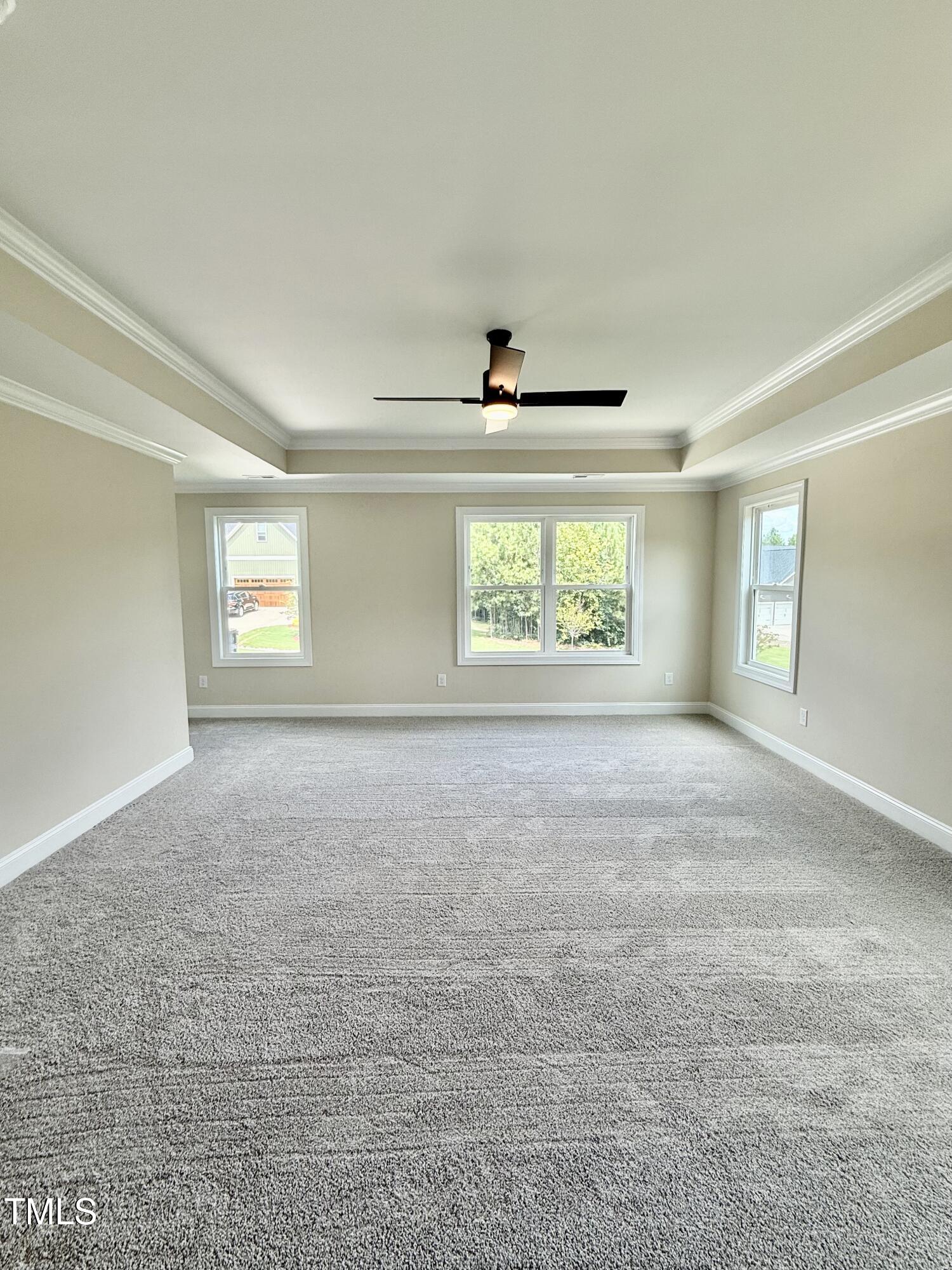 50 Moonraker Drive Spring Hope, NC 27882 - Photo 18 of 37 an empty room with windows and entrance