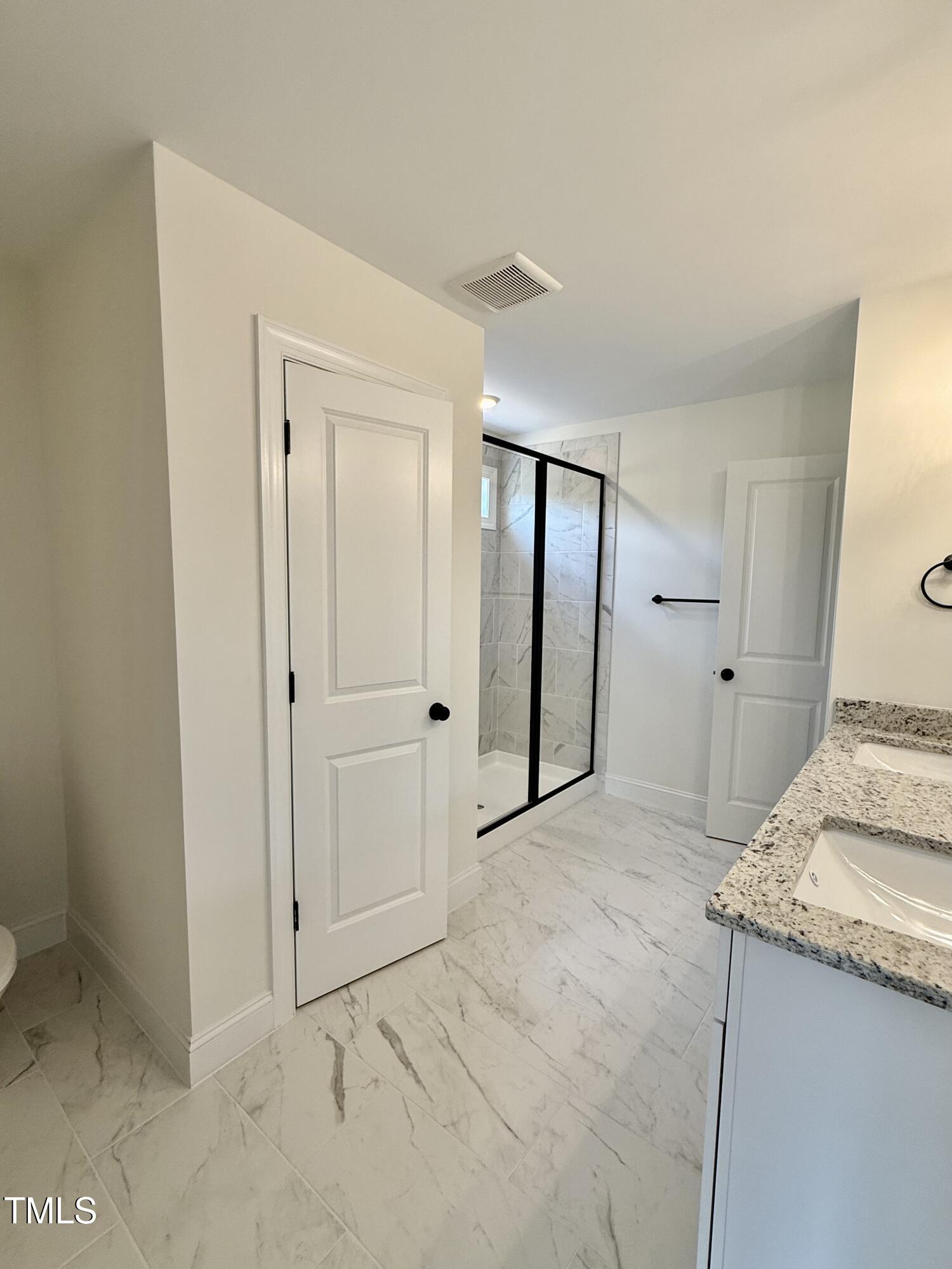 50 Moonraker Drive Spring Hope, NC 27882 - Photo 20 of 37 a view of a kitchen cabinets and a bathroom