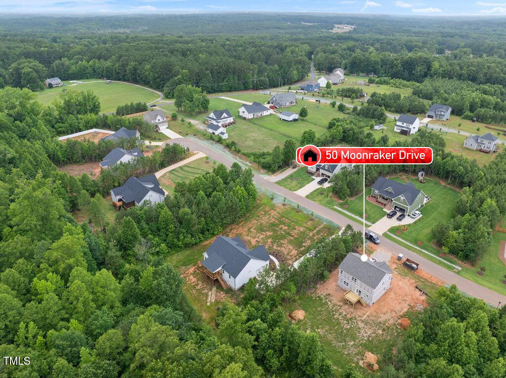 50 Moonraker Drive Spring Hope, NC 27882 - Photo 33 of 37 an aerial view of residential houses with outdoor space and street view