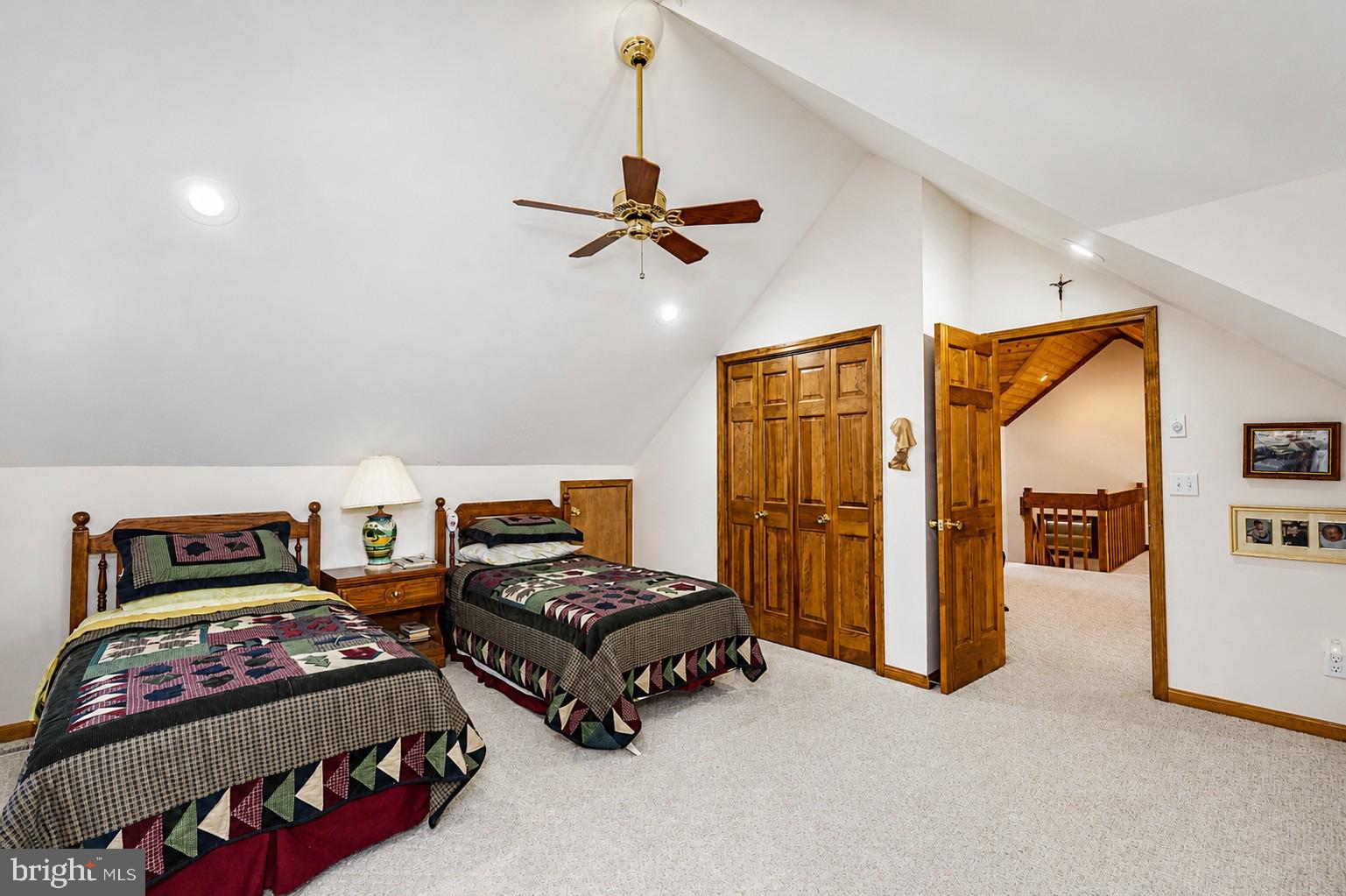 389 Sawmill Hollow Road Swanton, MD 21561 - Photo 35 of 62 a bedroom with furniture and a ceiling fan