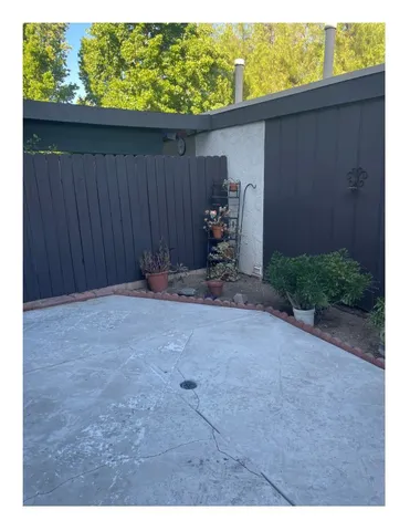 a view of a backyard with a garden