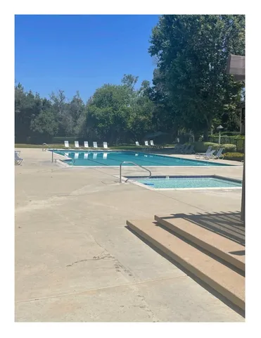 a view of a backyard with a garden