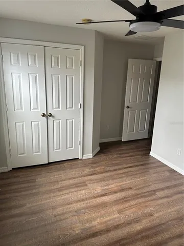 a view of a garage with wooden floor
