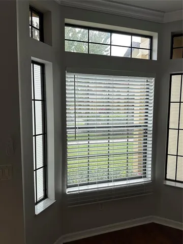 a view of a room that has a window in it