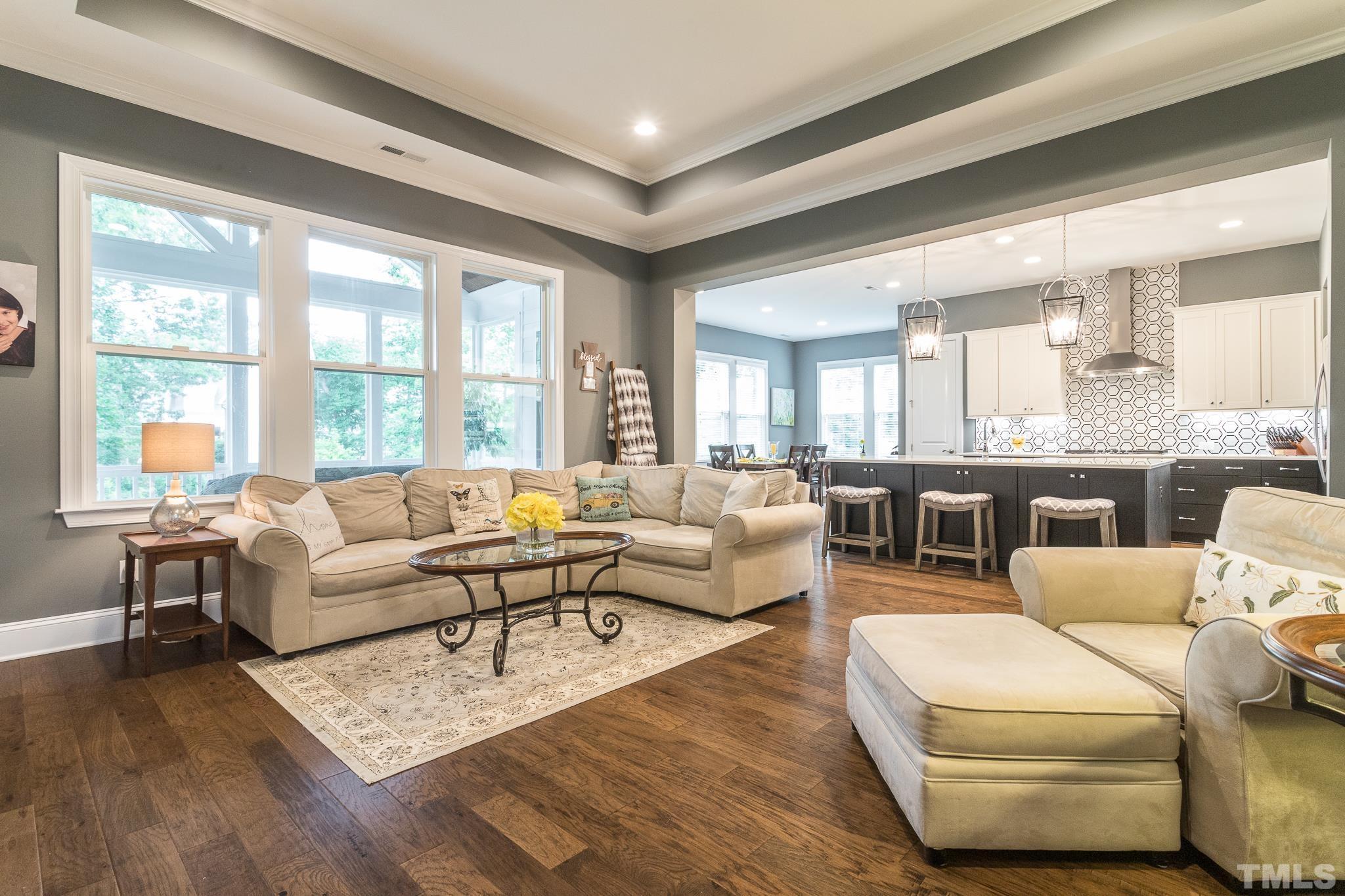 5281 Aleppo Lane Raleigh, NC 27613 - Photo 17 of 57 a living room with furniture and a large window