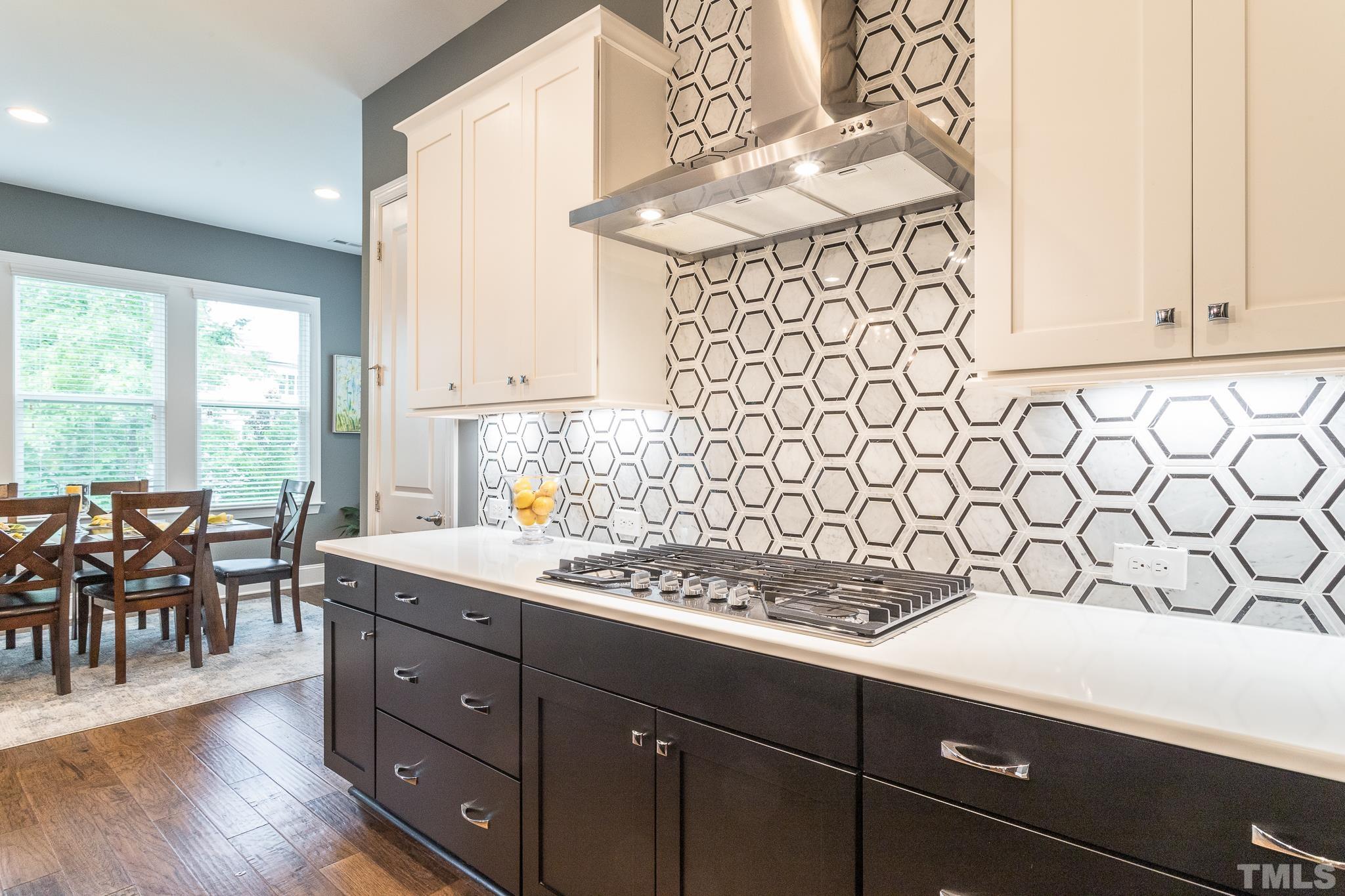 5281 Aleppo Lane Raleigh, NC 27613 - Photo 19 of 57 a kitchen with a sink and cabinets