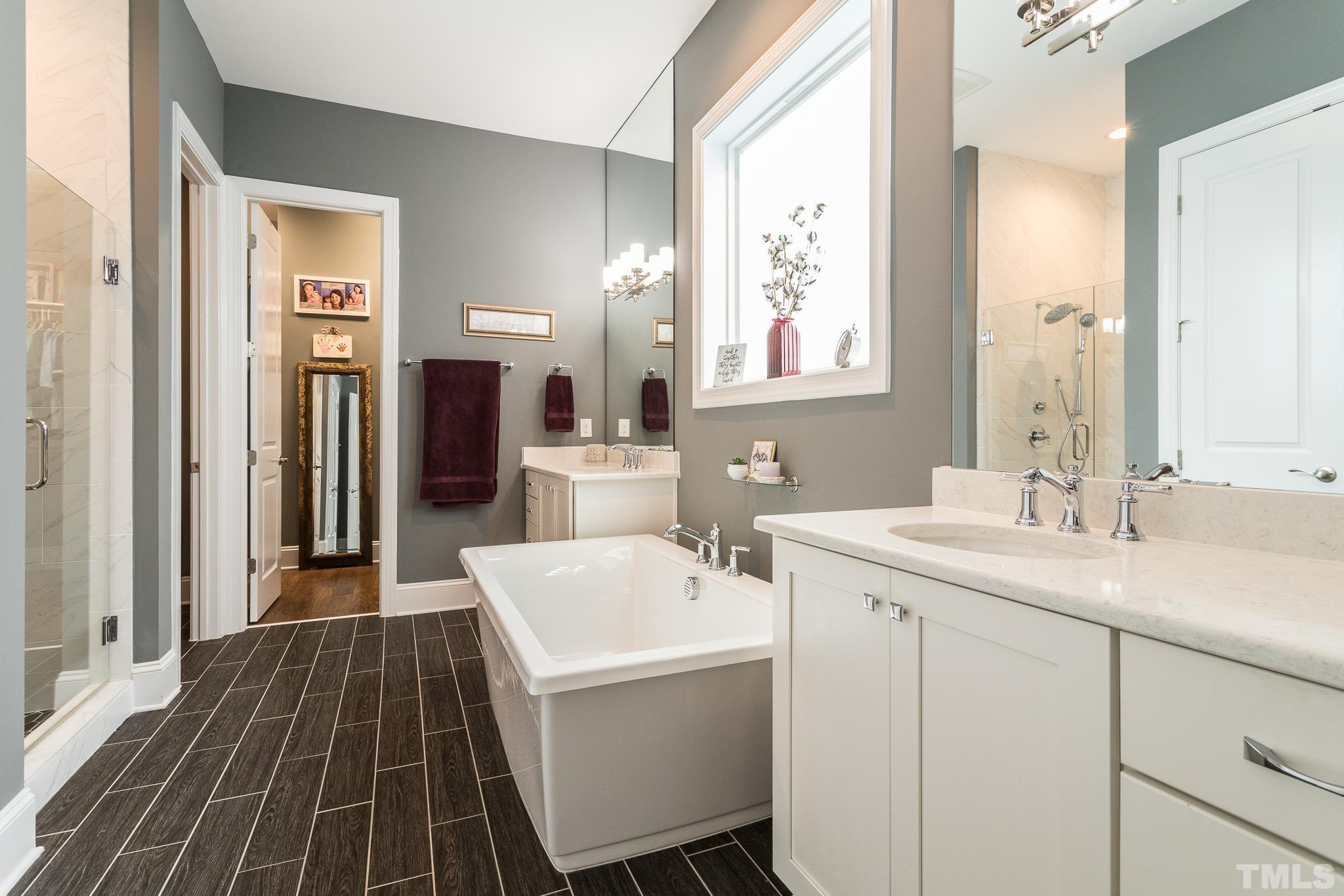 5281 Aleppo Lane Raleigh, NC 27613 - Photo 29 of 57 a bathroom with a sink and a mirror