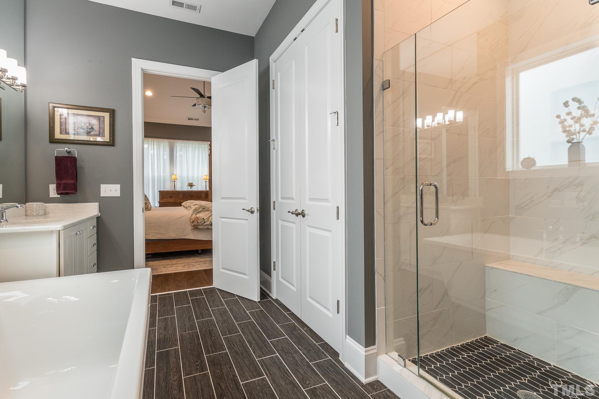 5281 Aleppo Lane Raleigh, NC 27613 - Photo 30 of 57 a bathroom with a sink and a mirror