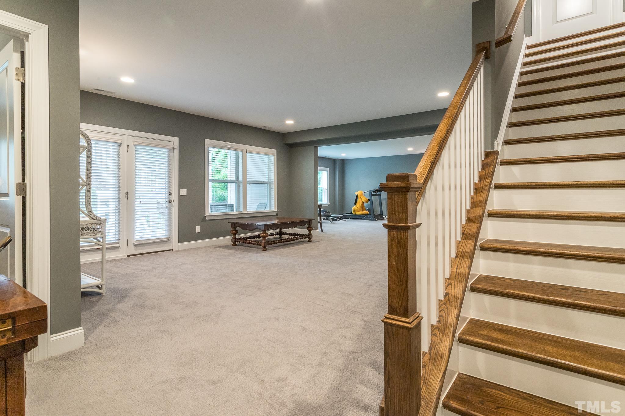 5281 Aleppo Lane Raleigh, NC 27613 - Photo 39 of 57 a view of entryway with wooden floor and windows