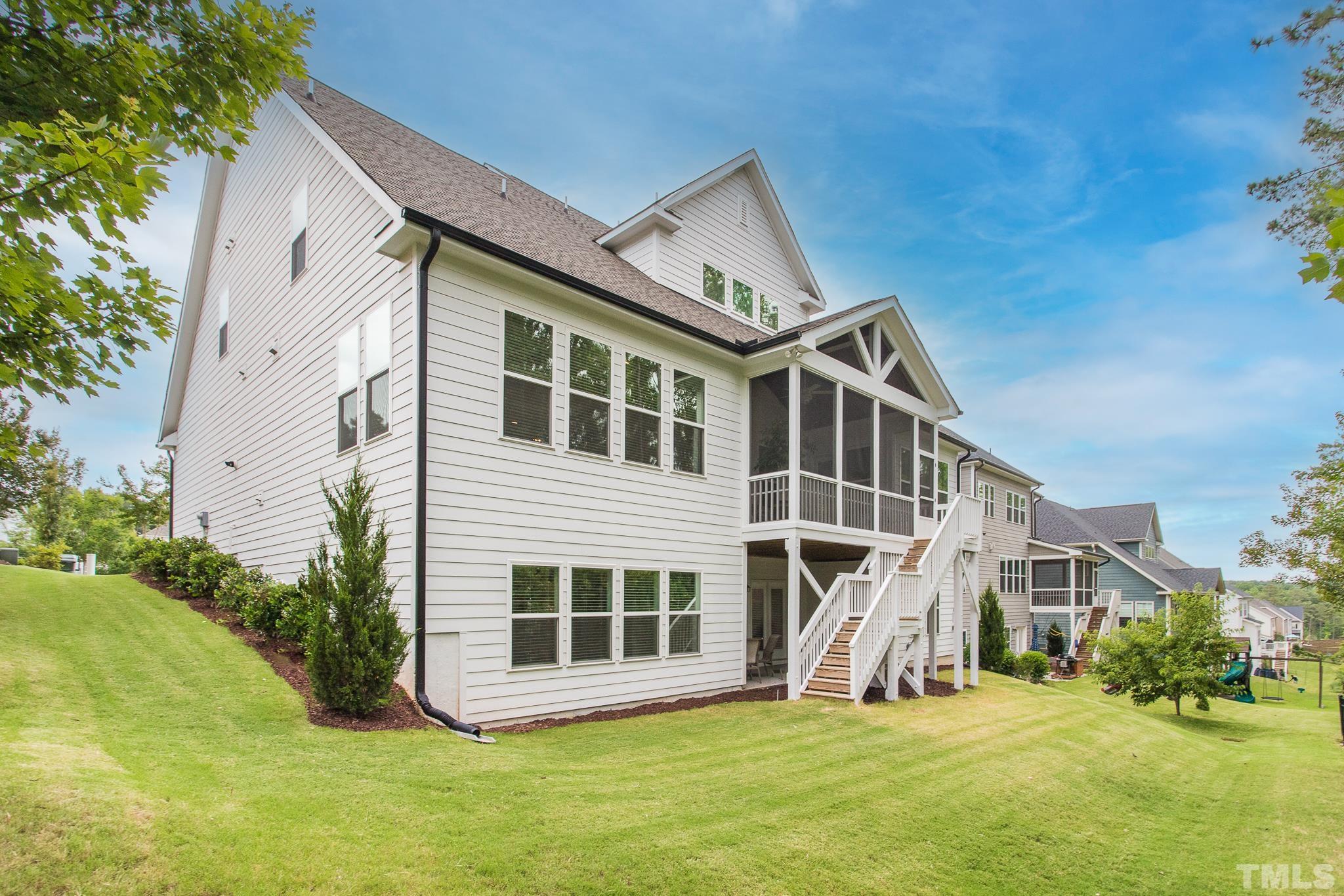 5281 Aleppo Lane Raleigh, NC 27613 - Photo 45 of 57 a view of a house with a yard