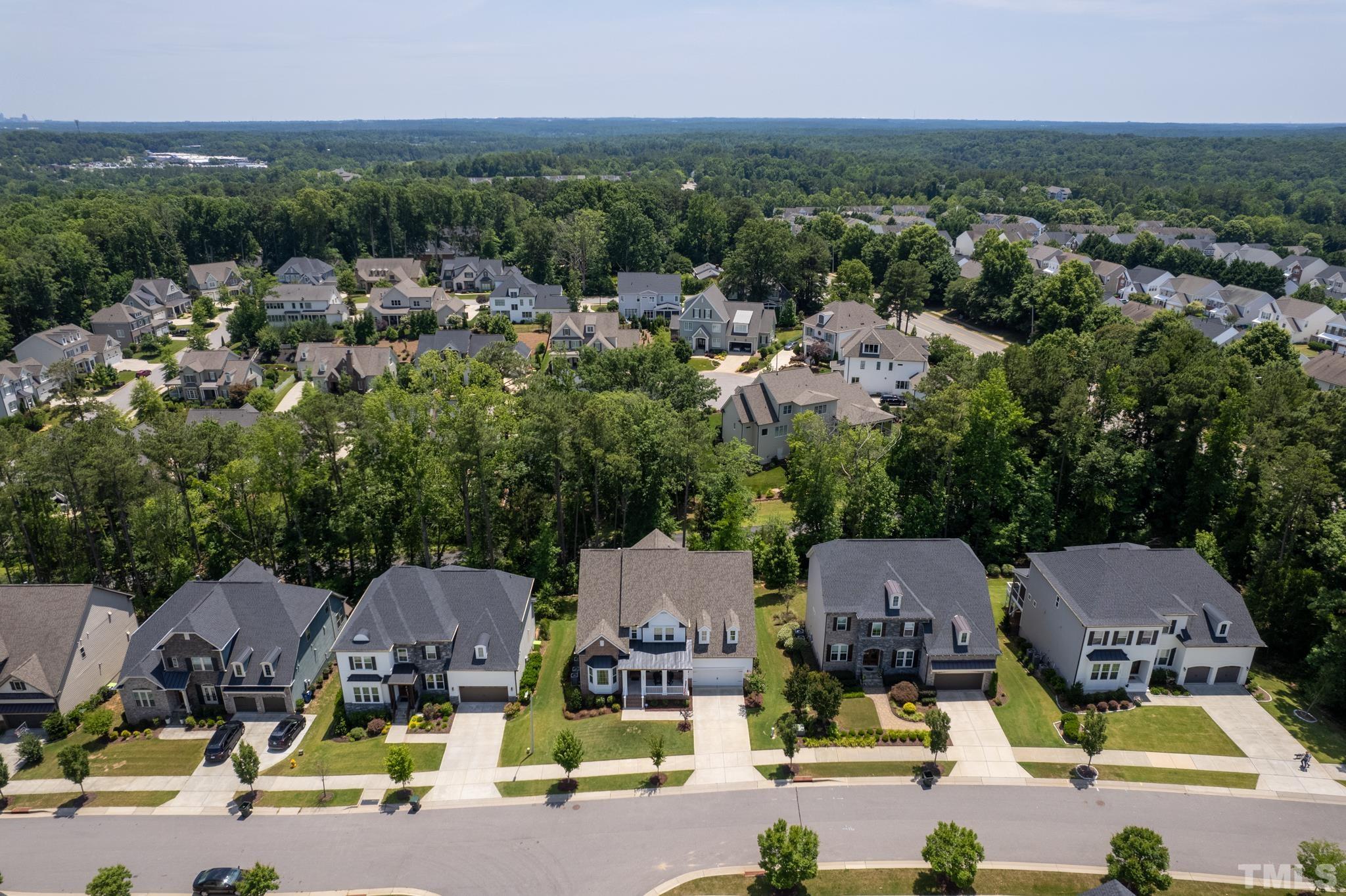 5281 Aleppo Lane Raleigh, NC 27613 - Photo 51 of 57 an aerial view of a houses with yard