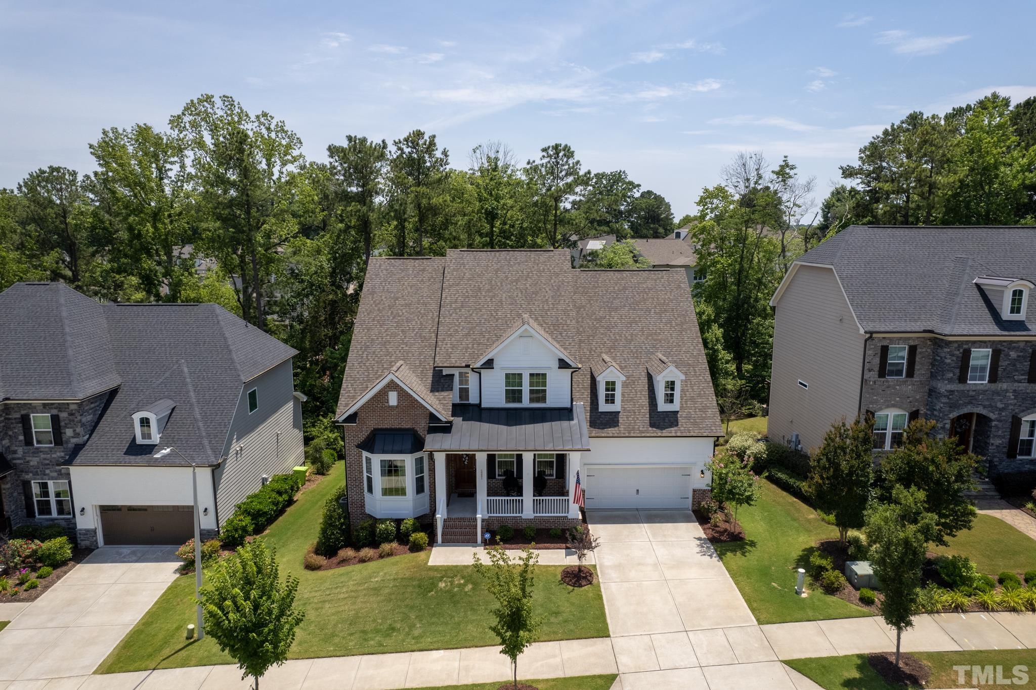 5281 Aleppo Lane Raleigh, NC 27613 - Photo 53 of 57 an aerial view of a house next to a yard