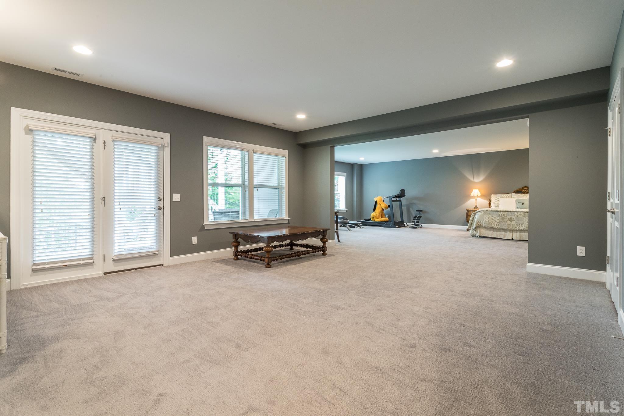 5281 Aleppo Lane Raleigh, NC 27613 - Photo 6 of 57 a view of a livingroom with furniture and a large window