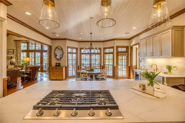 a view of a dining room with furniture window and outside view