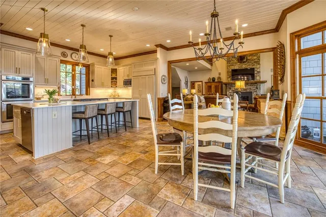 a view of a kitchen with sink dryer and washer