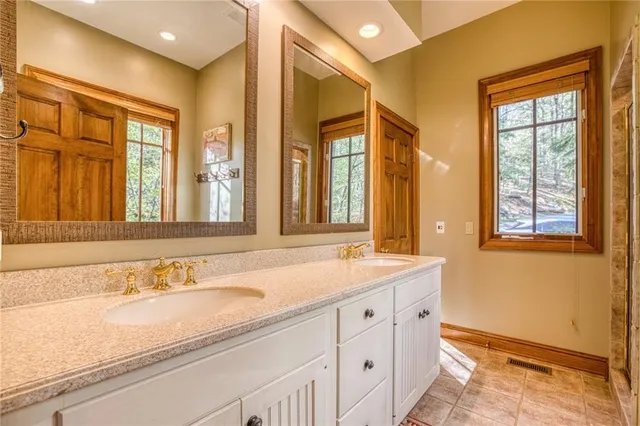 a view of a livingroom with furniture and window
