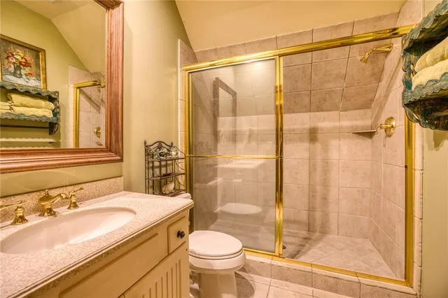 an outdoor view from a balcony with furniture