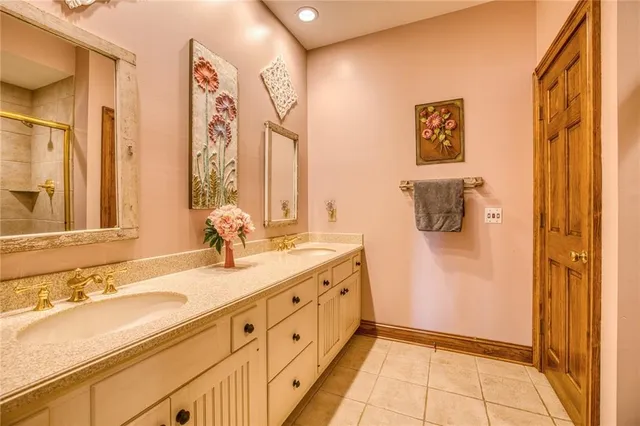 a view of a balcony with chairs and wooden floor