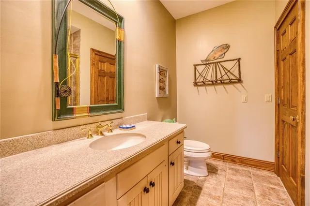 a view of a patio with table and chairs potted plants