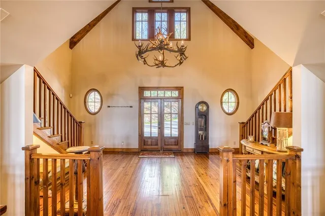 a view of entryway with wooden floor