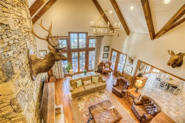 a kitchen with stainless steel appliances granite countertop a sink and cabinets